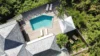 Aerial view of a St Barts villa rental with private pool, sun deck, and tropical garden setting.