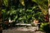 Secluded garden corner with bench and tropical greenery at St Barts vacation rental