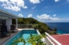 Cliffside plunge pool with sun loungers and ocean view at St Barts villa rental