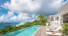 Luxury villa suite in St Barts with airy décor, crisp linens, and sea-facing windows.