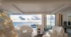 Elegant living room in St Barts villa with white sofas, oceanfront terrace, and sunset views.