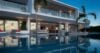 Modern luxury villa with illuminated pool and terraces in St Barts vacation rental