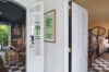 Charming interior of St Barts villa with bedroom, dining area, and vintage tile flooring