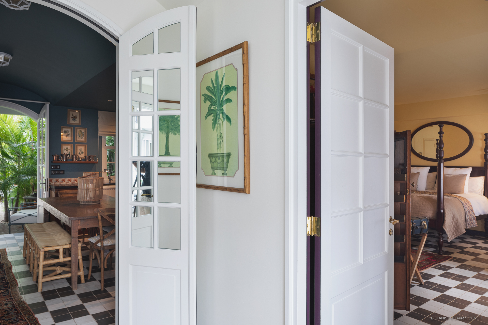 Charming interior of St Barts villa with bedroom, dining area, and vintage tile flooring