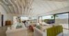 Spacious living room at St Barts villa with vaulted ceiling and ocean-view terrace