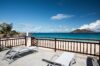 Oceanfront terrace with lounge chairs overlooking Flamands Beach and turquoise waters, luxury villa rental St Barts