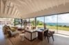 Spacious living room with vaulted ceiling and panoramic ocean views at a luxury St Barts villa.