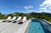 Private plunge pool with sun loungers on deck at hillside St Barts villa rental