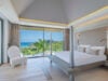 Stylish bedroom at Villa Loukoko in St Barts with king-size bed and ocean-facing windows