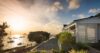 St Barts villa terrace with sunset views over anchored sailboats in the Caribbean
