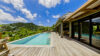 Luxury villa suite in St Barts with soft natural light and sweeping Caribbean horizon.