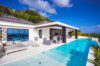 Villa with infinity pool, outdoor lounge, and sea views in St Barts luxury rentals.