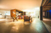 Spacious open-plan living and dining area with modern decor at St Barts villa rental
