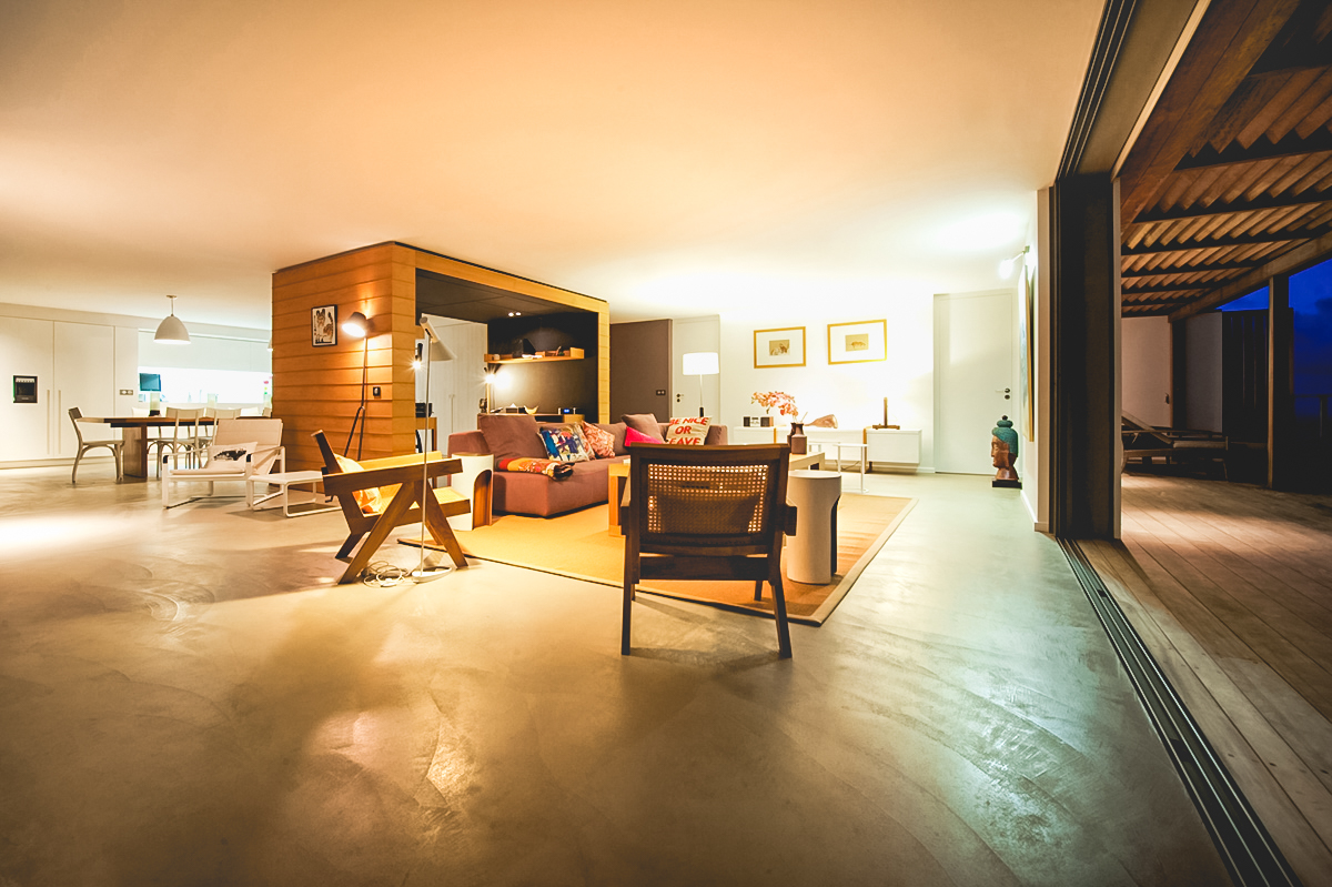 Spacious open-plan living and dining area with modern decor at St Barts villa rental
