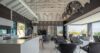 Modern open kitchen and lounge with vaulted ceiling at luxury villa in St Barts.