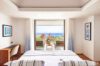 Bright bedroom with ocean-view terrace at a luxury St Barts vacation rental villa