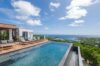 Infinity pool with sun loungers and panoramic ocean view at St Barthelemy luxury villa rental.