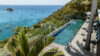 Clifftop villa with long infinity pool, sun loungers, and panoramic views of Gustavia harbor and Caribbean Sea in St Barts rental