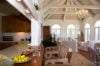 Elegant open-plan living room with vaulted ceiling and natural light, luxury villa rental in St Barts