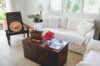 Cozy living room with white sofa and tropical accents at private villa rentals st barths.