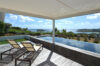 Terrace with sun loungers and infinity pool overlooking the Caribbean Sea at Villa Plumbago, st barts villa rental
