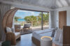 Elegant bedroom with balcony and ocean view at private villa rental in St Barthélemy
