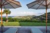 Scenic terrace with sun umbrellas and panoramic island view, luxury villa rental in St Barts
