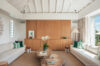 Contemporary living room with natural wood accents and neutral décor, luxury villa rental in St Barts
