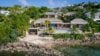 Aerial view of Villa Plumbago with infinity pool and private beach along the Colombier coast, st barts villa rental