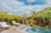 Secluded pool terrace surrounded by tropical gardens at Villa Amancaya, a luxury St Barts villa rental