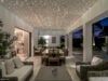 Evening terrace with starlit ceiling, dining area, and lounge seating at a luxury St Barths villa rental.