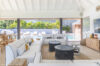 Stylish open living area with pool view at a luxury St Barts villa rental.