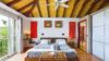 Bright bedroom with vaulted ceiling and garden view at private villa rentals st barts