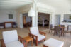 Open-air living pavilion with lounge seating and direct bedroom access at Villa Plumbago, luxury villa rental in St Barts